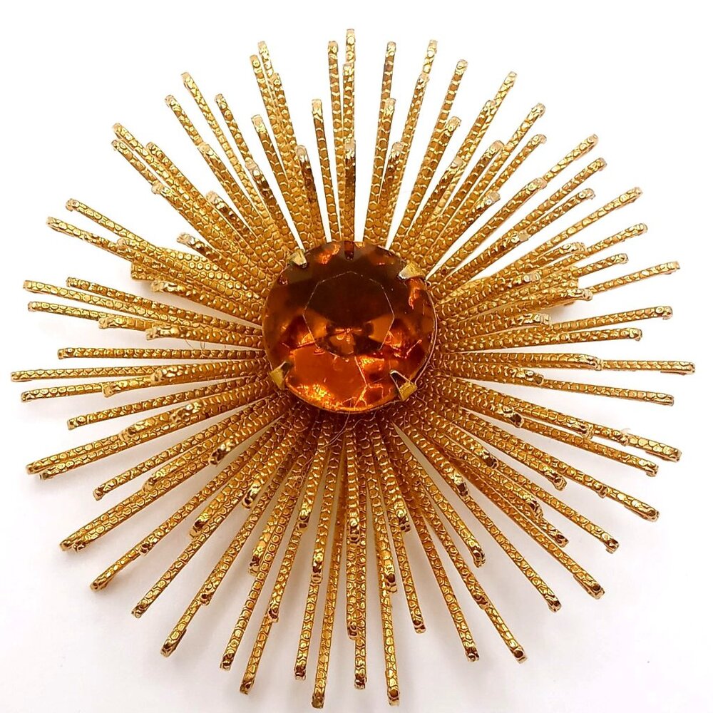 Sarah Coventry Brooch Gold Tone Metal Starburst Amber Rhinestone Center Vintage